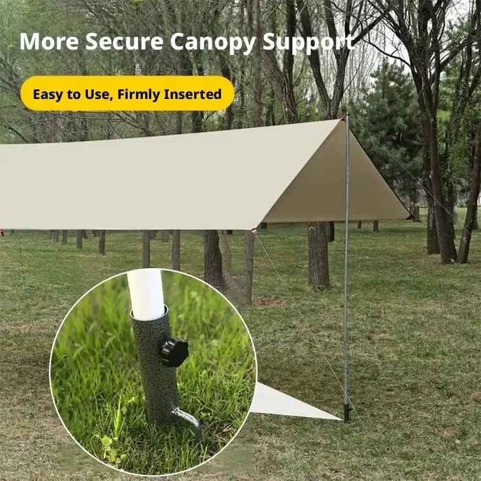 Structure de tente de camping avec piquets de fixation au sol