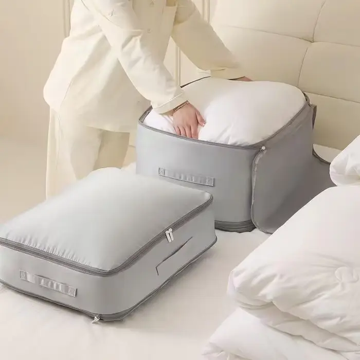 Sac de rangement auto-compressible pour couette