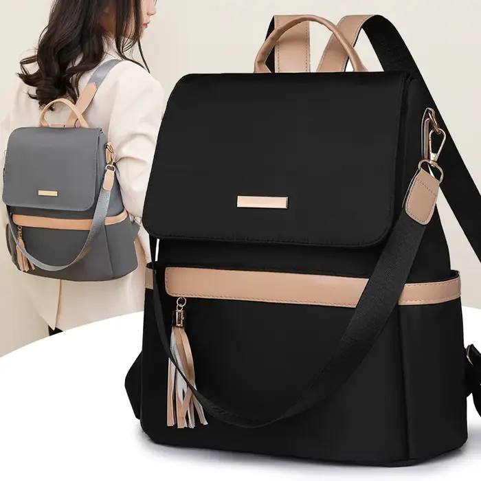 1 sac à dos classique antivol de taille moyenne avec des bretelles réglables noires minimalistes