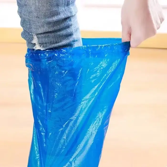 Couvre-chaussures de pluie jetable