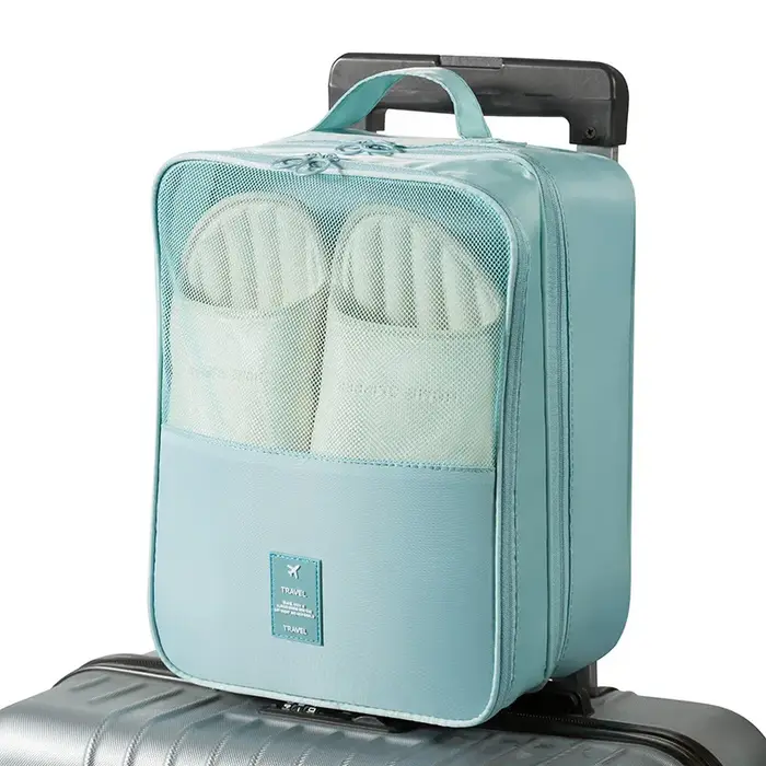 Le sac à chaussures de voyage peut contenir 3 paires de chaussures